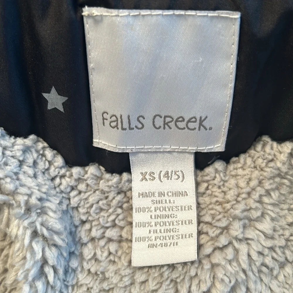 Girls hooded winter coat size XS (4/5) in black with silver stars.
